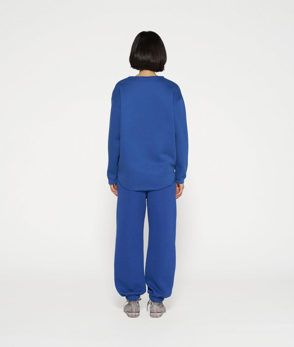 raw edge statement sweater | true blue