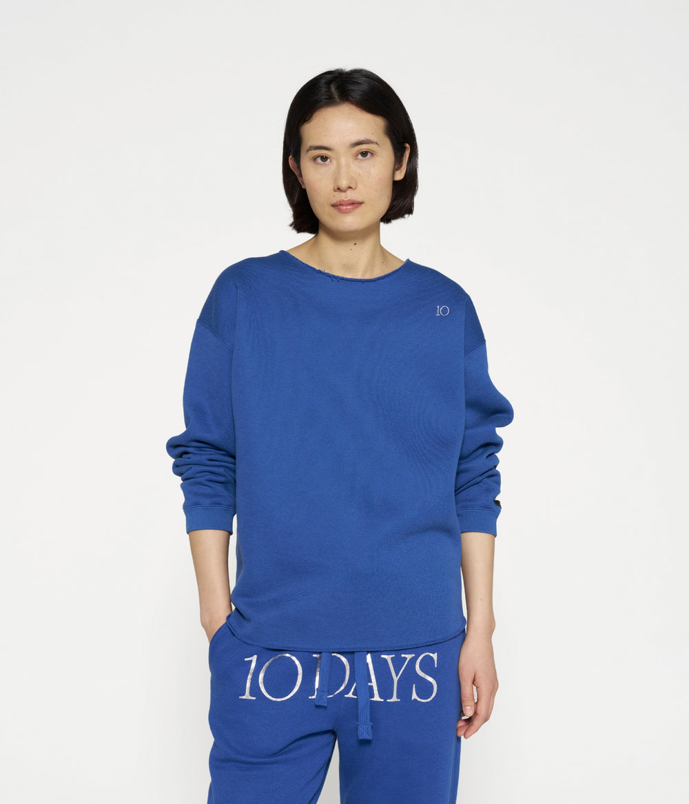 raw edge statement sweater | true blue