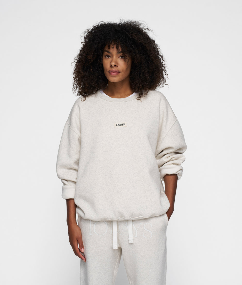 THE CLEAN STATEMENT SWEATER | soft white melee