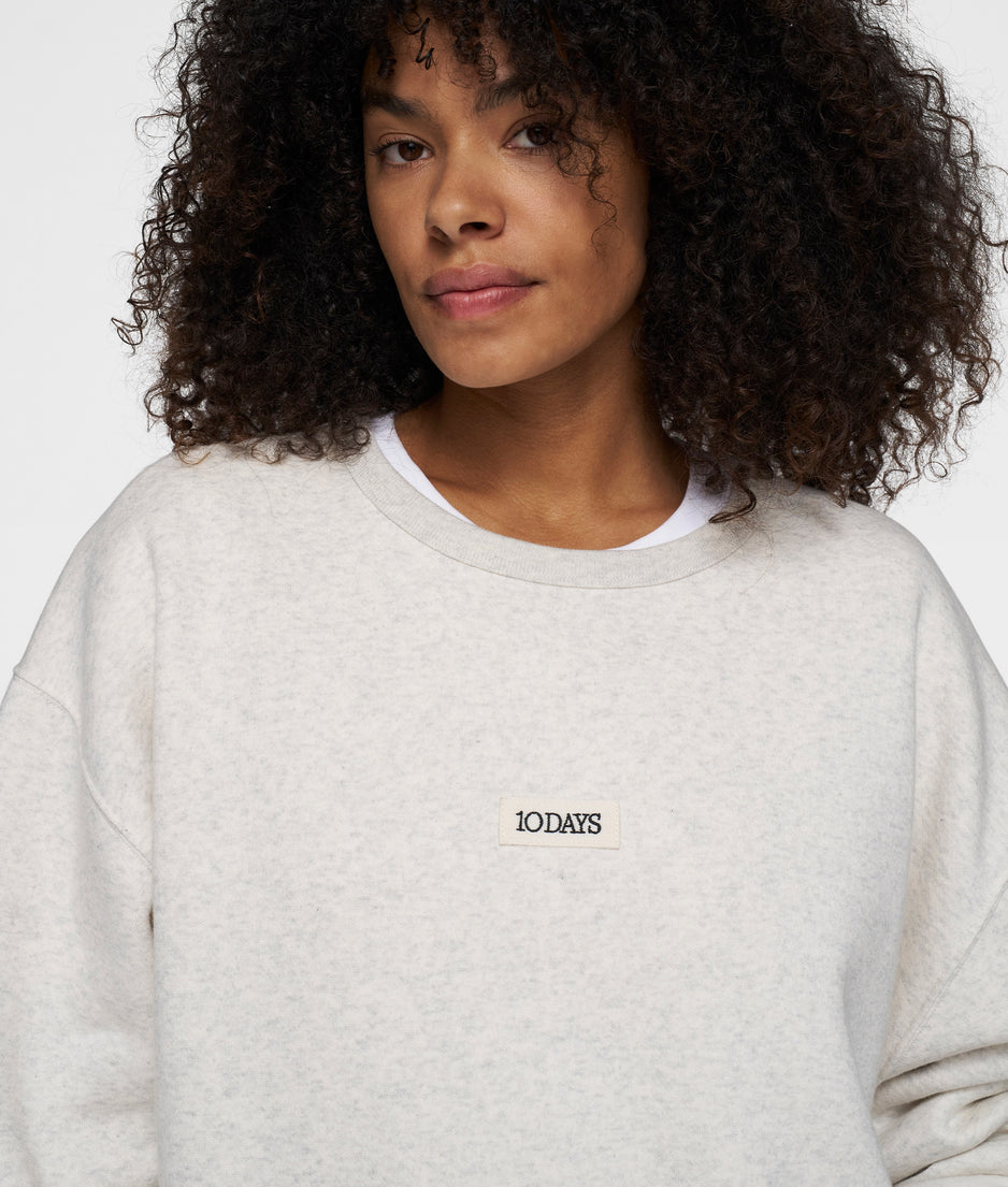 THE CLEAN STATEMENT SWEATER | soft white melee